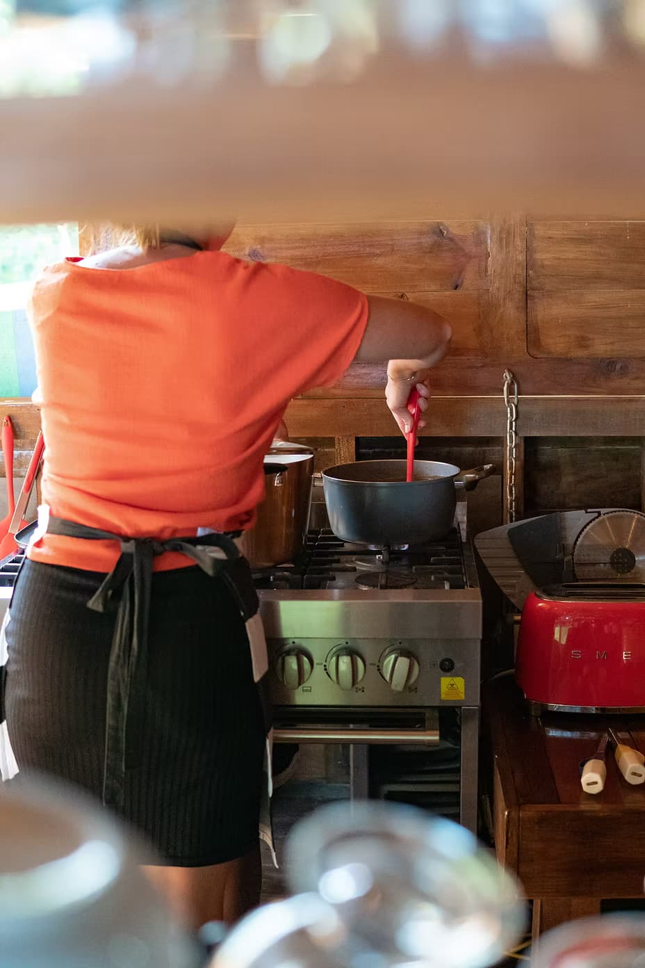 Chef preparing farm-to-table dishes with fresh local ingredients at Blå Bar Restaurant, Dolphin Blue Paradise, Bocas del Toro