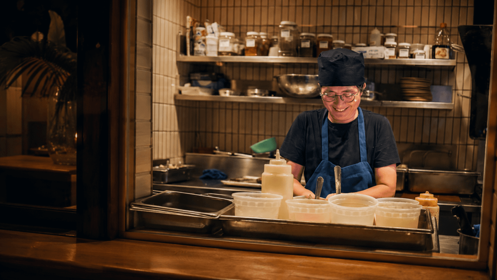 Chef Yuh at her station in the Dolphin Blue Paradise kitchen