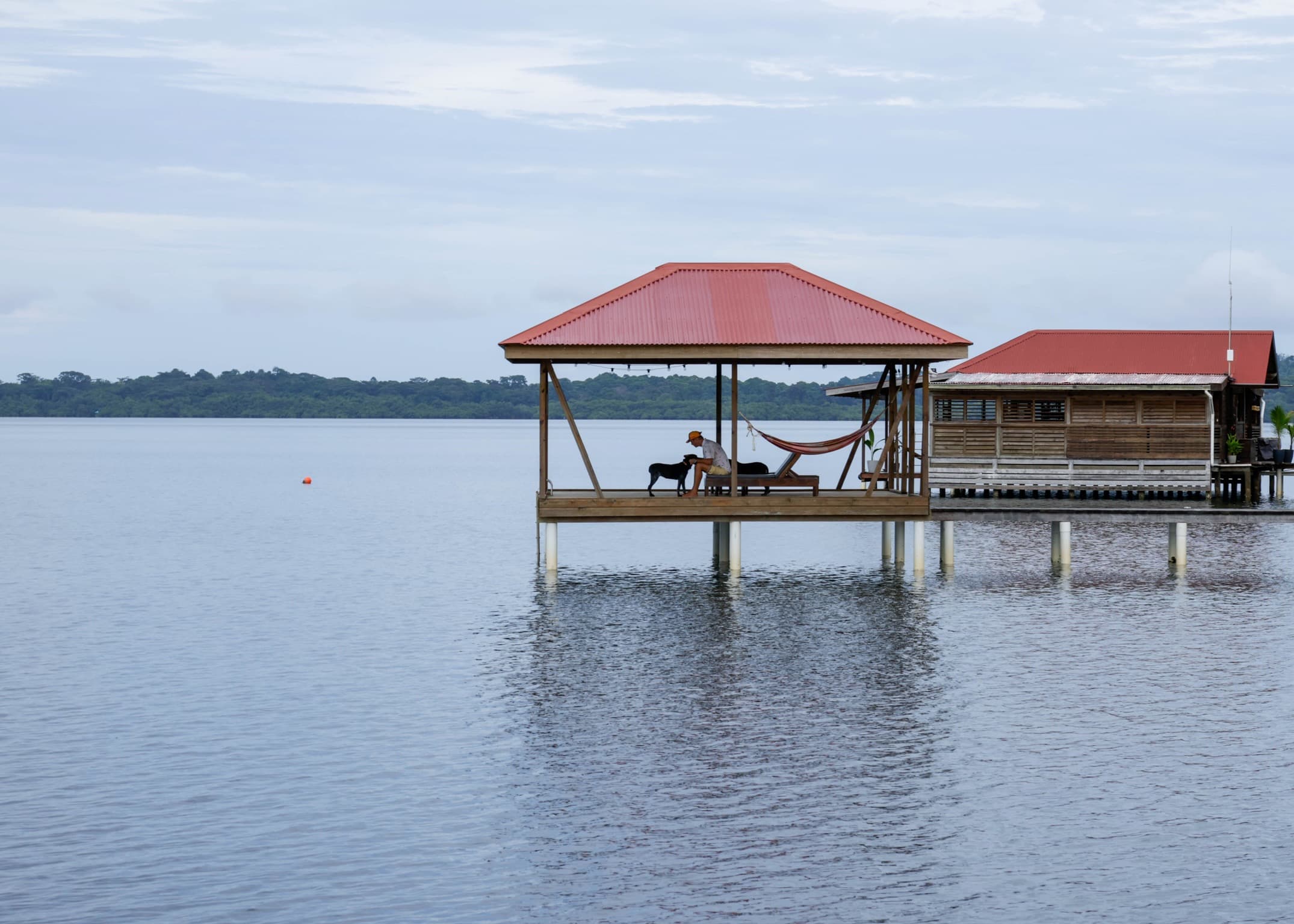 Overwater gazebo and structures on swim platform at Dolphin Blue Paradise, Bocas del Toro - relaxing over Dolphin Bay